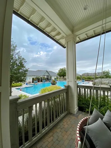 a view of a two chair in the balcony