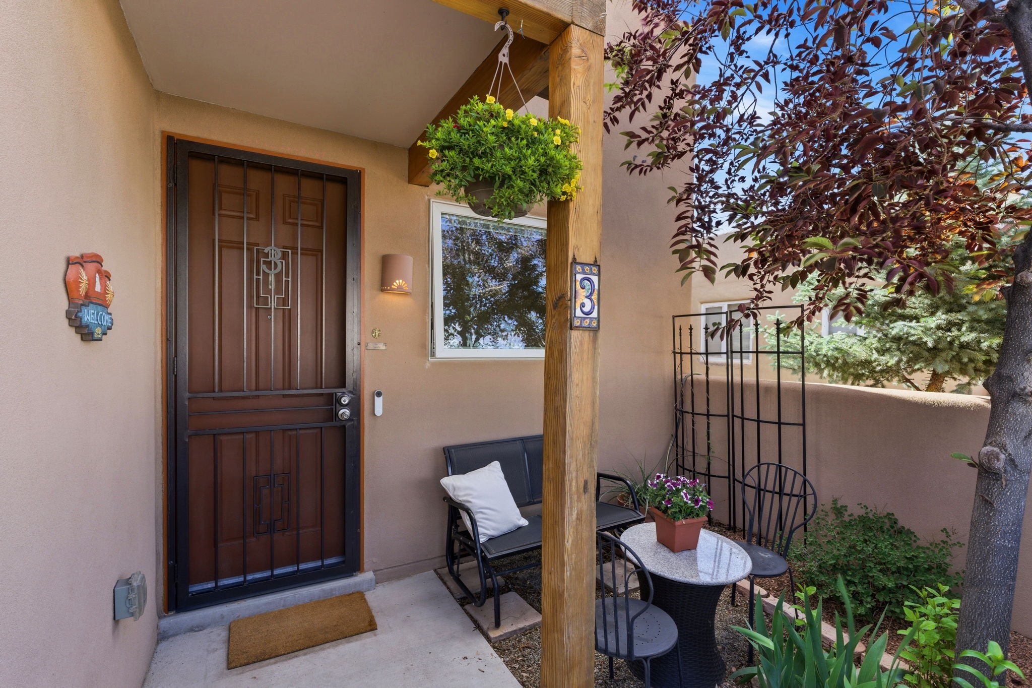 3 Silver Buckle Road Santa Fe, NM 87508 - Photo 9 of 34 Front entry with outdoor seating area