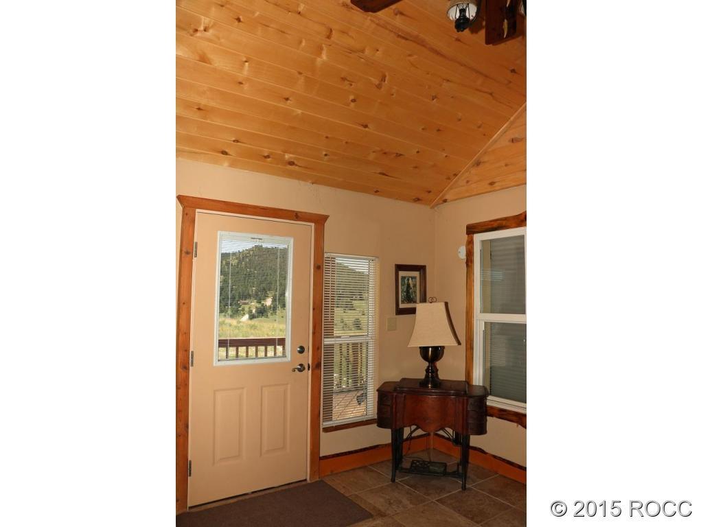 159 Kankakee Road Westcliffe, CO 81252 - Photo 14 of 22 a picture of a bench in a room