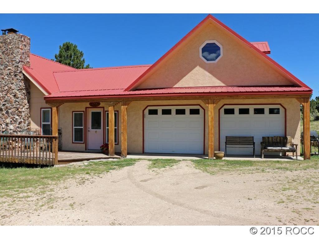 159 Kankakee Road Westcliffe, CO 81252 - Photo 17 of 22 a view of a house with a garden