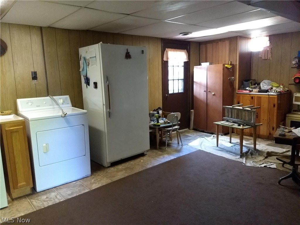 8168 Vermilion Road Amherst, OH 44001 - Photo 15 of 25 laundry room in basement with outside entrance to back yard.