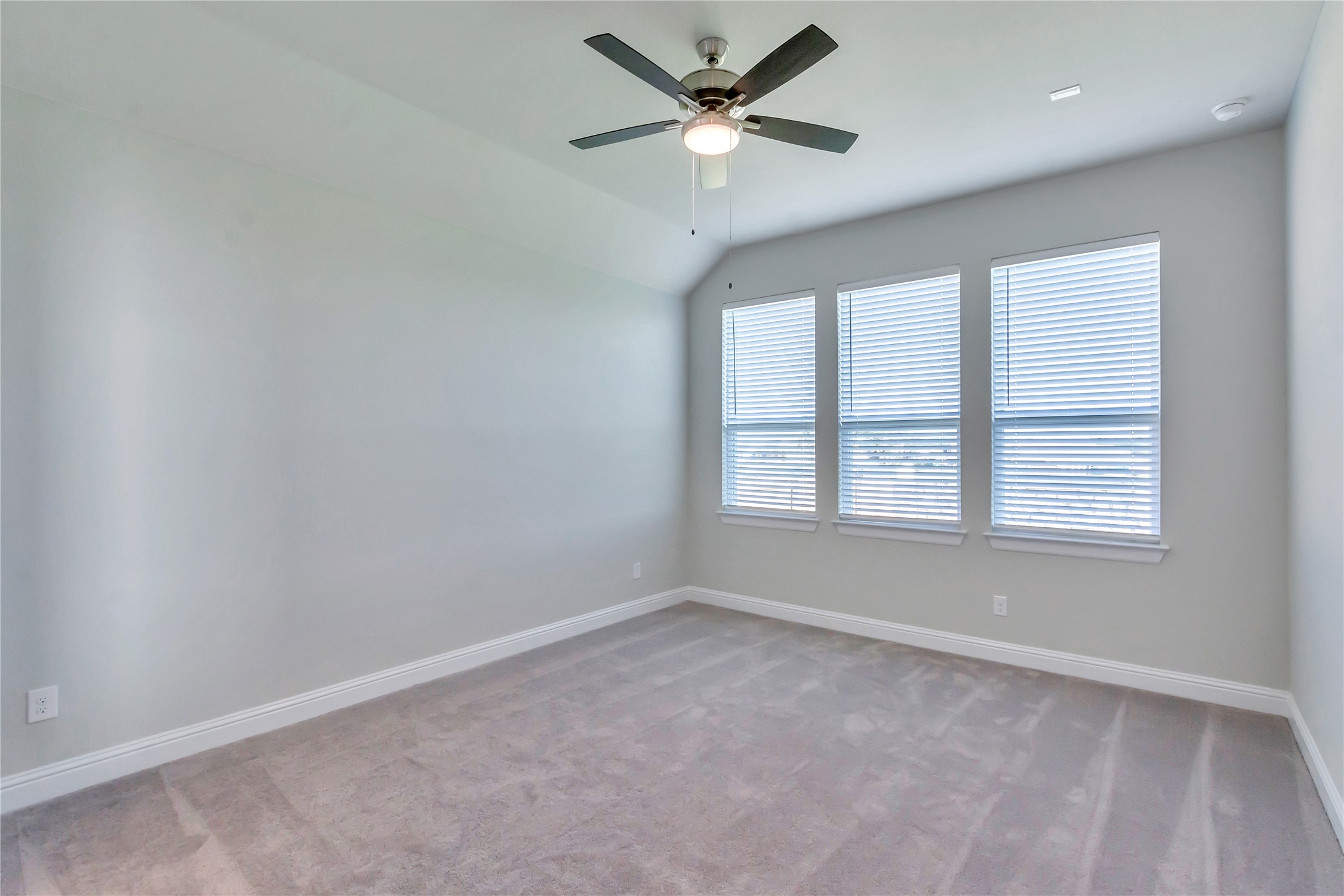 2140 Base Burner Path Leander, TX 78641 - Photo 16 of 27 an empty room with a window and a fan
