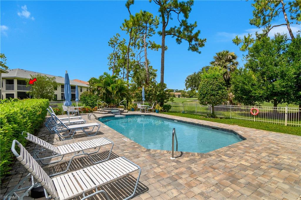 701 Augusta Boulevard, Unit 7018 Naples, FL 34113 - Photo 29 of 30 a view of swimming pool with seating space