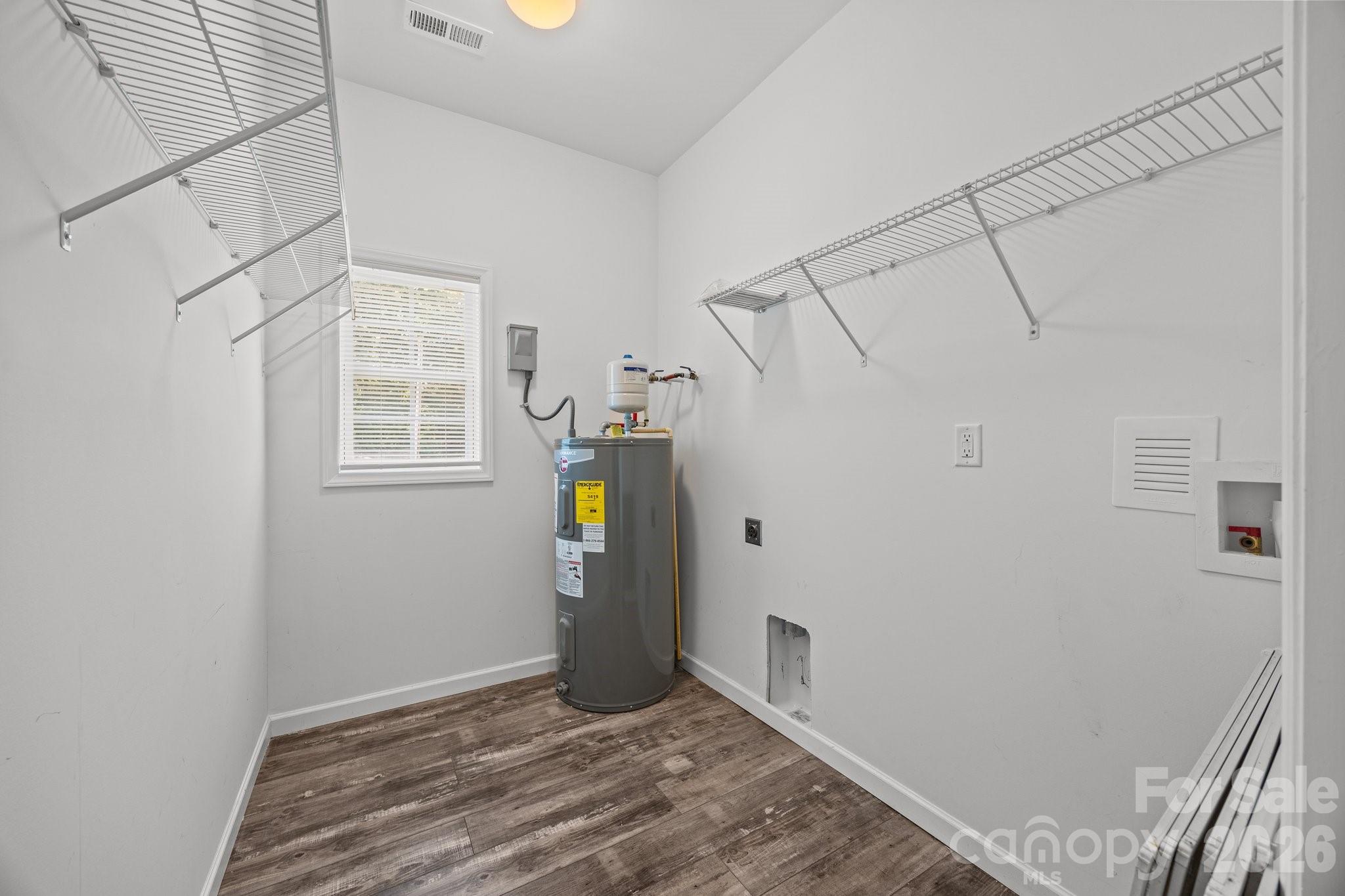 14532 East Rocky River Road Davidson, NC 28036 - Photo 28 of 32 a view of empty room with wooden floor and fan