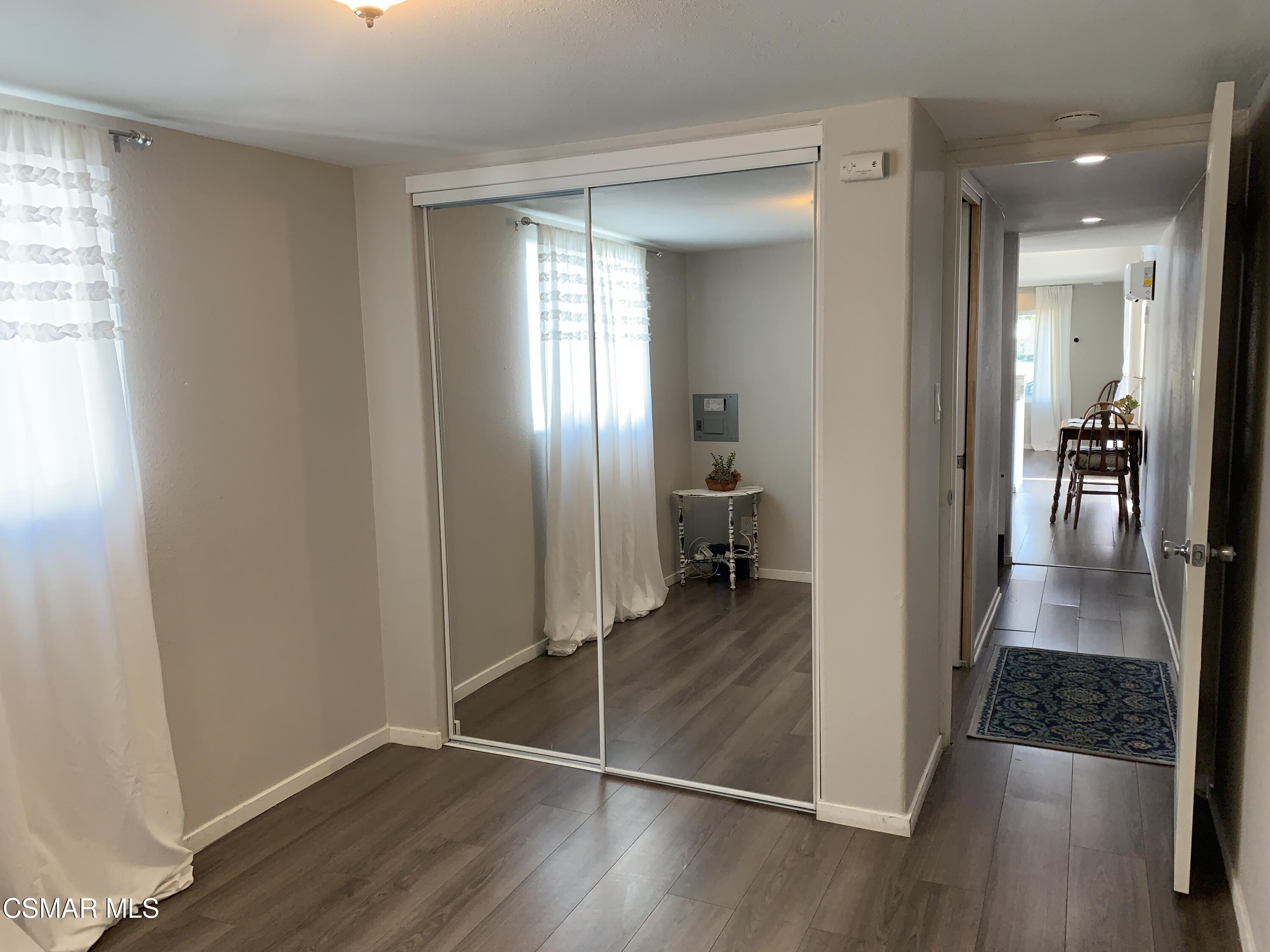 4381 Cochran Street, Unit 10 Simi Valley, CA 93063 - Photo 24 of 32 wooden floor in a room with a window