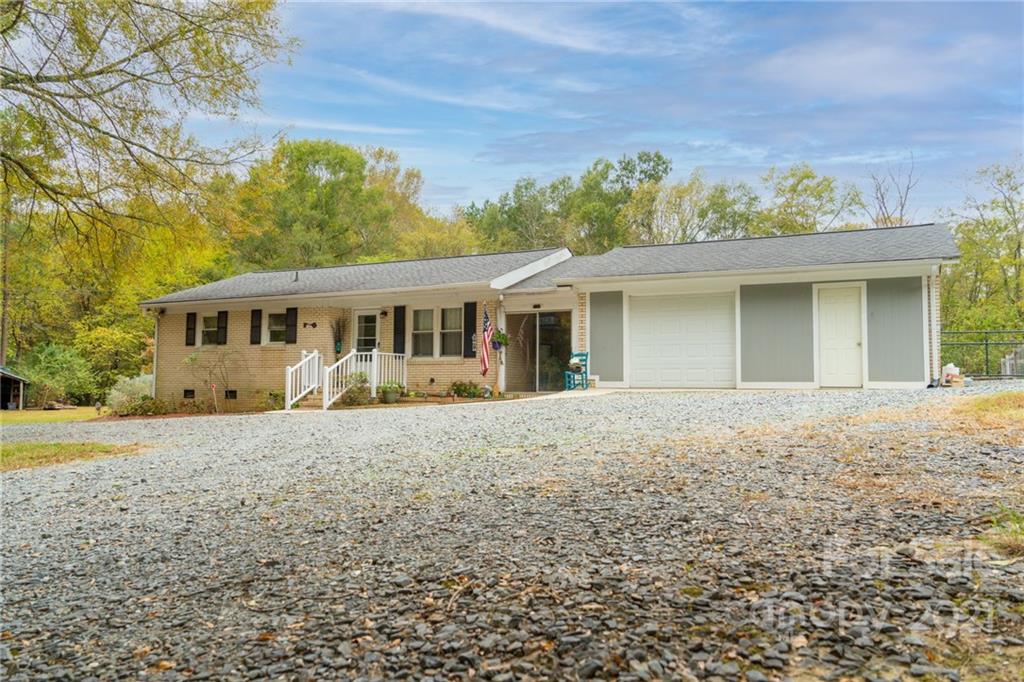 4150 McCoy Street Midland, NC 28107 - Photo 1 of 26 front view of a house with a big yard