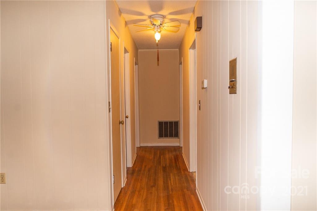 4150 McCoy Street Midland, NC 28107 - Photo 14 of 26 a view of a hallway with wooden floor