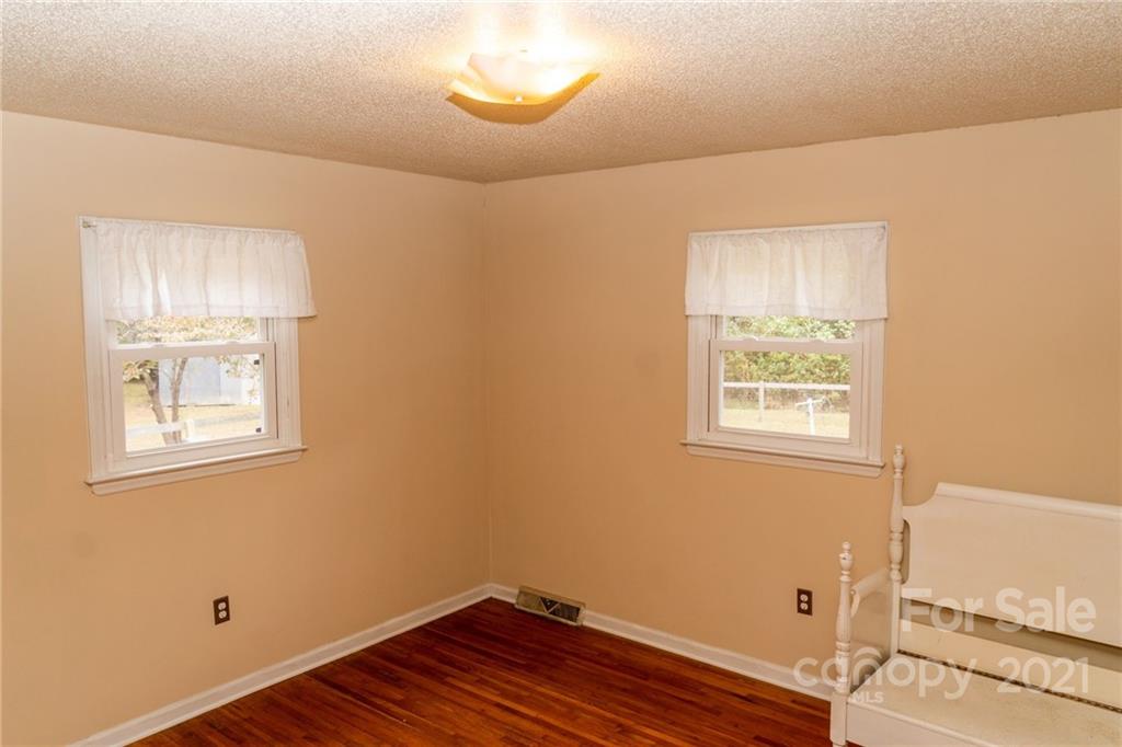 4150 McCoy Street Midland, NC 28107 - Photo 18 of 26 an empty room with windows