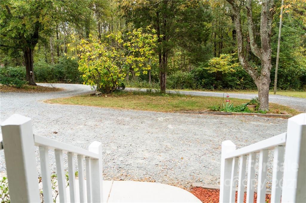 4150 McCoy Street Midland, NC 28107 - Photo 7 of 26 a view of backyard with large trees