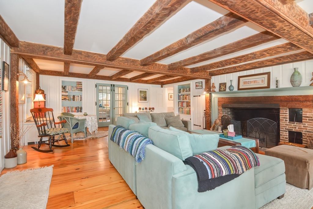 72 Appledor Road, Unit A Framingham, MA 01701 - Photo 1 of 39 a living room with furniture and a fireplace