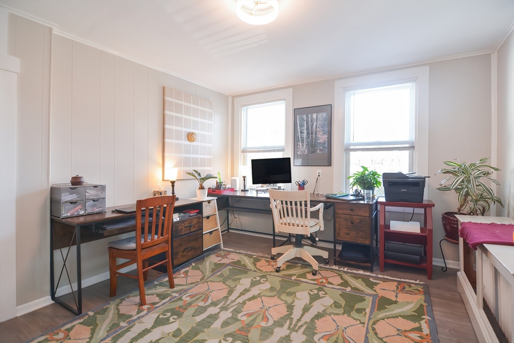 72 Appledor Road, Unit A Framingham, MA 01701 - Photo 33 of 39 a living room with furniture a window and a table