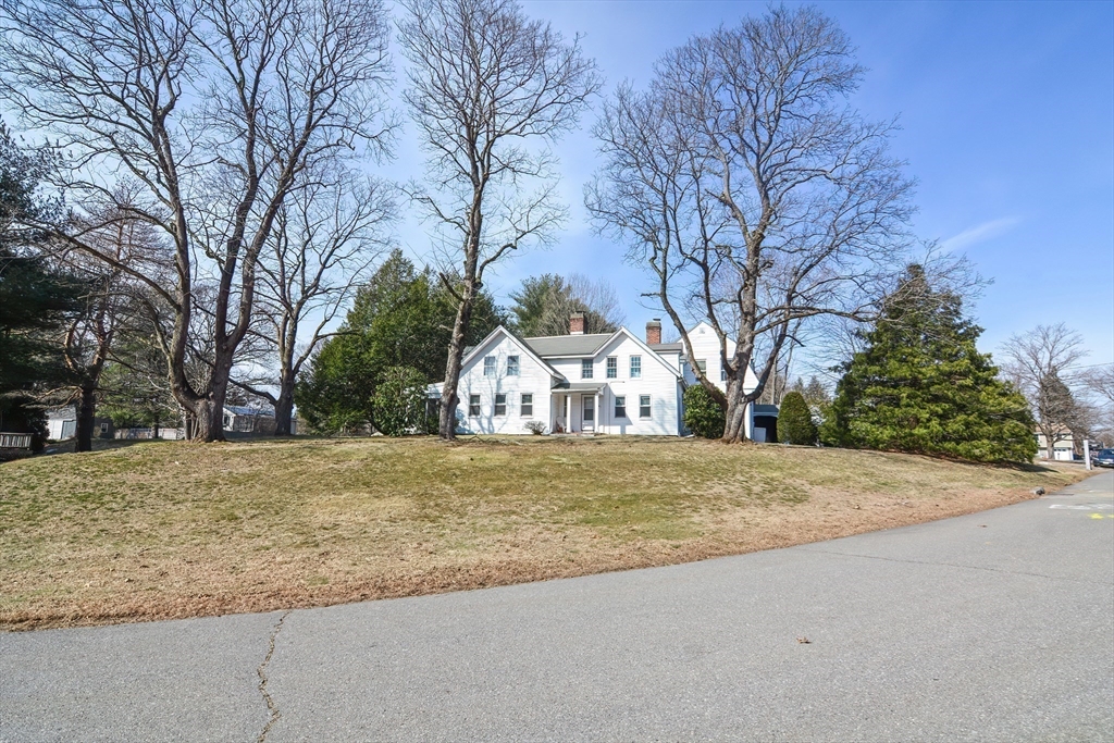 72 Appledor Road, Unit A Framingham, MA 01701 - Photo 5 of 39 a view of a yard with large trees