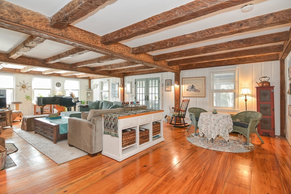 72 Appledor Road, Unit A Framingham, MA 01701 - Photo 8 of 39 a living room with furniture and a kitchen view
