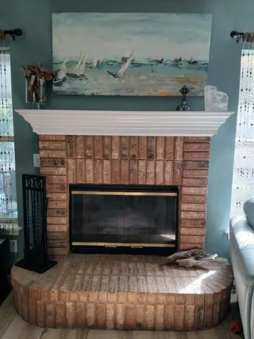 a living room with a fireplace