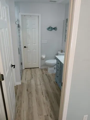 a bathroom with a sink and toilet