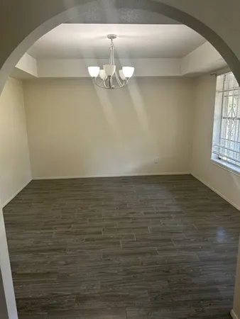 a view of a room with an empty space