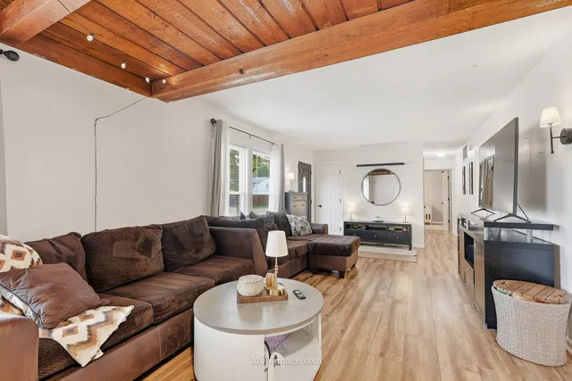 a view of livingroom with furniture and wooden floor