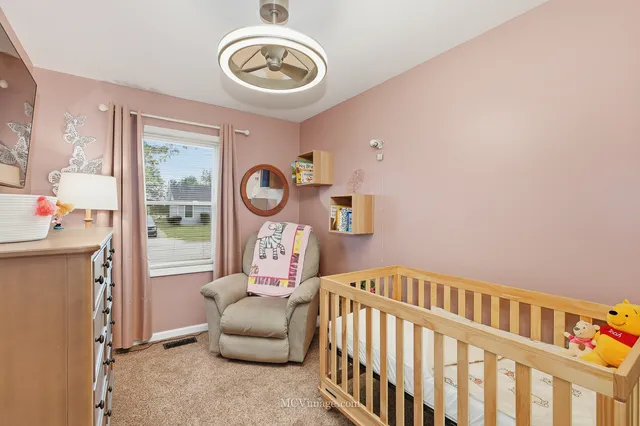 a utility room with sink dryer and washer