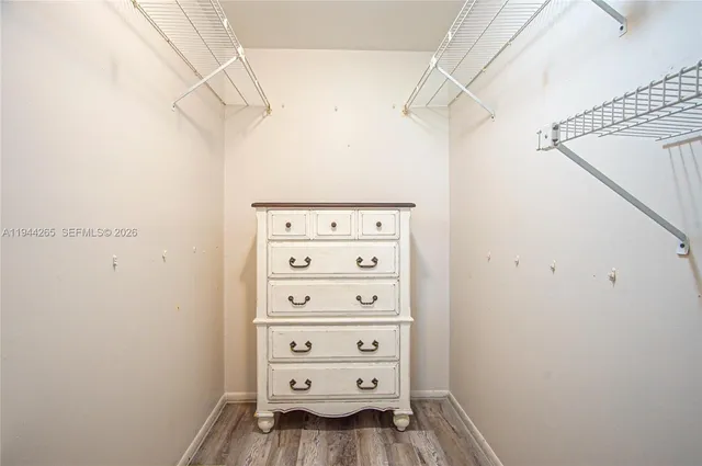a view of a closet in the kitchen