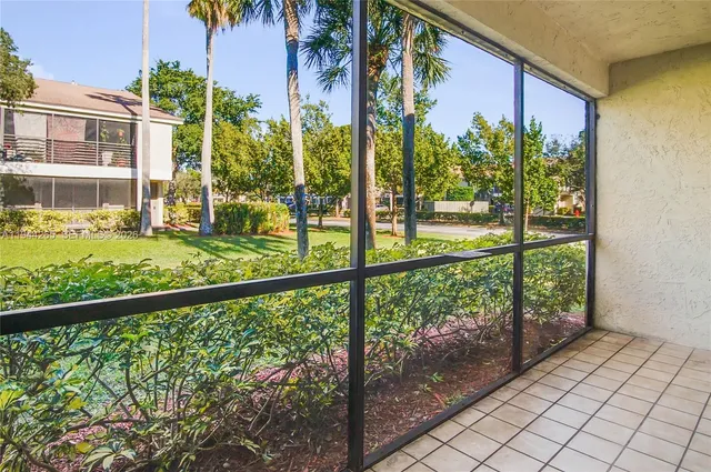 a view of a porch and a yard