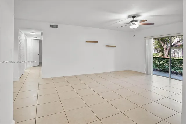 a view of an empty room and window