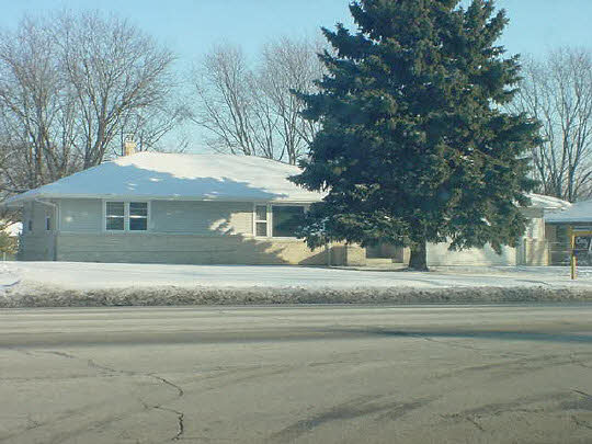 925 North Alpine Road Rockford, IL 61107 - Photo 1 of 6 a front view of a house with a yard