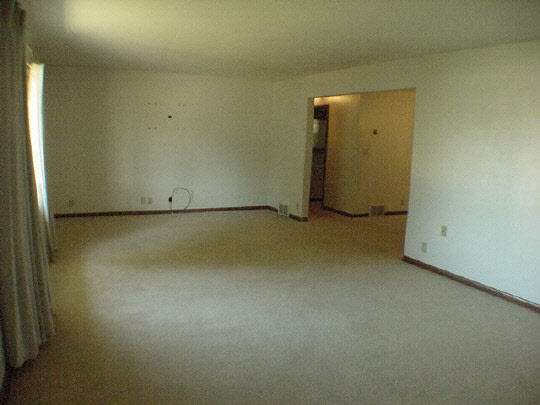925 North Alpine Road Rockford, IL 61107 - Photo 3 of 6 an empty room with a door