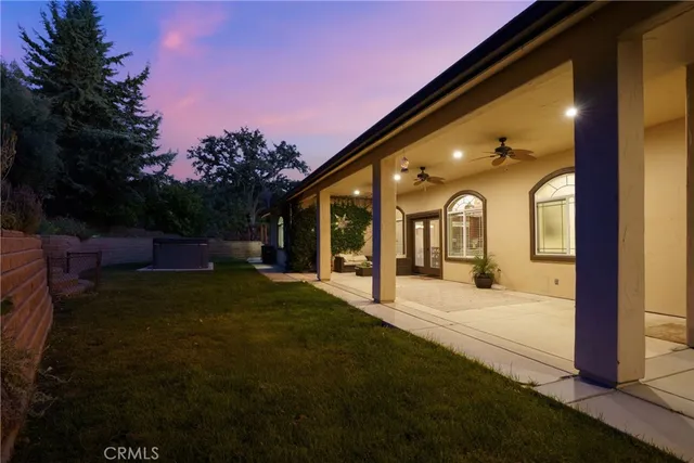 a view of swimming pool with an outdoor seating
