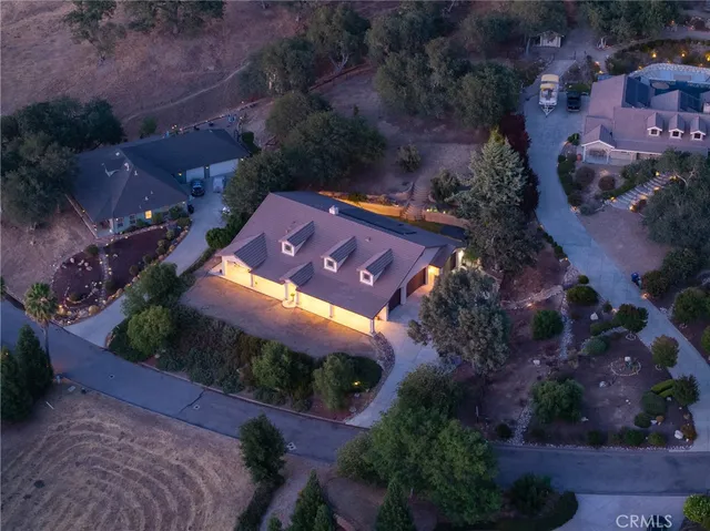 an aerial view of a house with a garden
