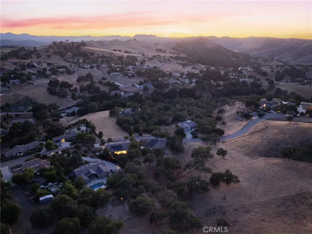a view of a city with mountains in the background