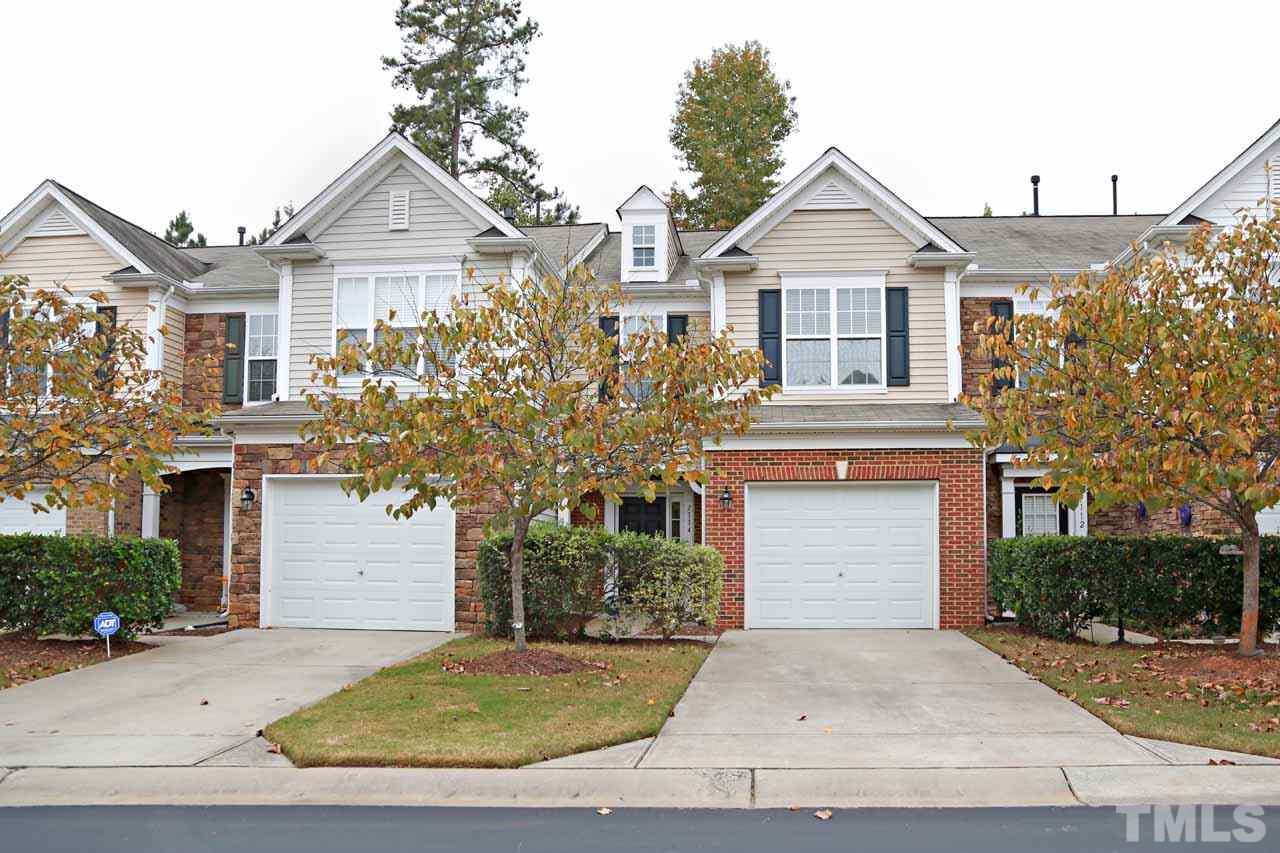 7114 Racine Way Raleigh, NC 27615 - Photo 1 of 23 front view of a house with a yard