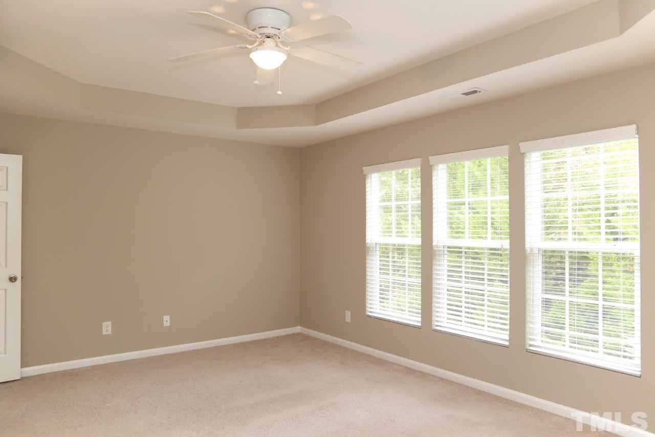 7114 Racine Way Raleigh, NC 27615 - Photo 17 of 23 a view of an empty room with a window