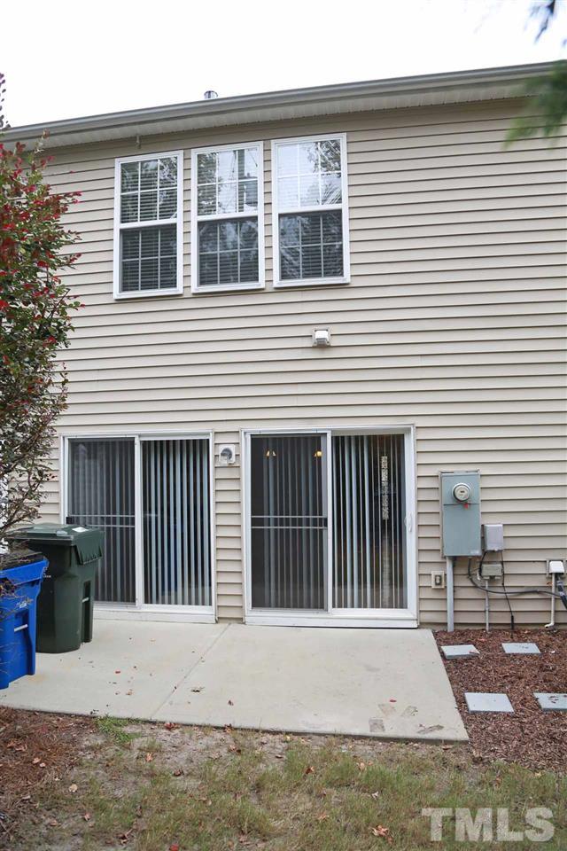 7114 Racine Way Raleigh, NC 27615 - Photo 21 of 23 a front view of a house with windows