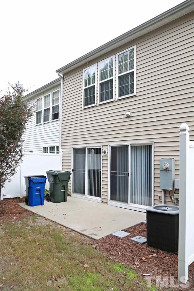 7114 Racine Way Raleigh, NC 27615 - Photo 22 of 23 a front view of house with outdoor space