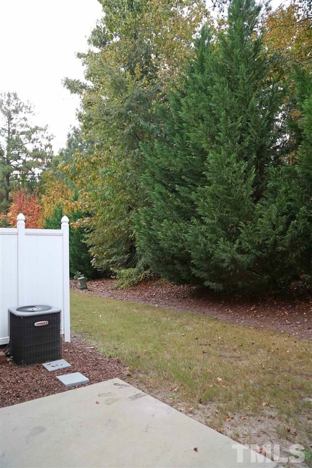 7114 Racine Way Raleigh, NC 27615 - Photo 23 of 23 a view of a backyard