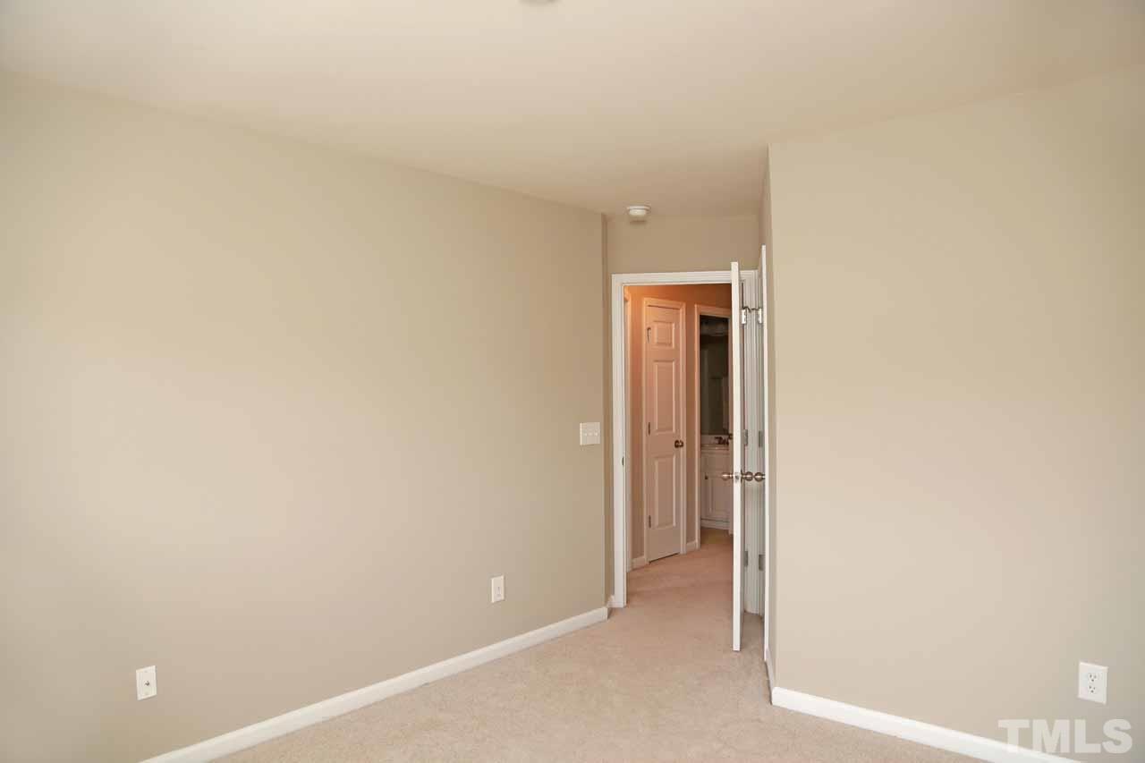 7114 Racine Way Raleigh, NC 27615 - Photo 9 of 23 a view of an empty room