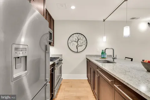 a view of a hallway with washer dryer