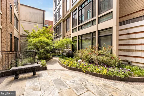 a garden view with a seating space