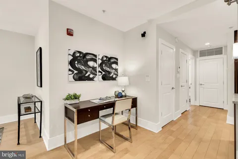 a view of a workspace with furniture