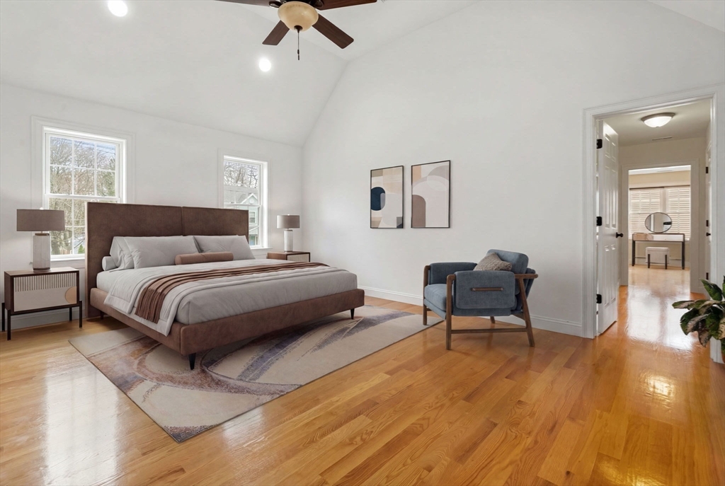 30 Neponset Street Walpole, MA 02071 - Photo 25 of 41 a bedroom with a bed and wooden floor