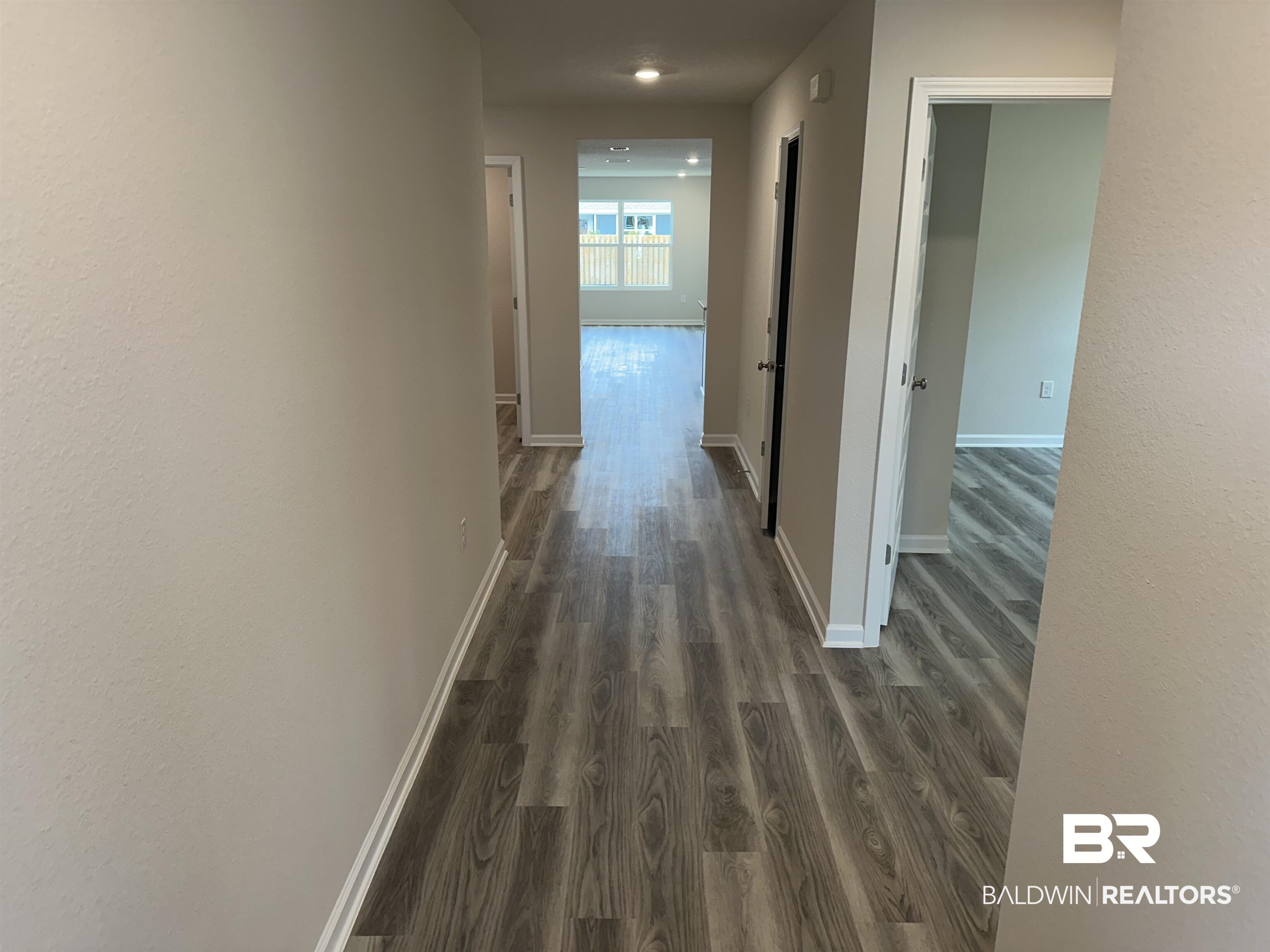 1238 Hayward Loop Foley, AL 36535 - Photo 7 of 46 Hall featuring dark hardwood / wood-style floors