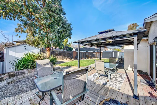 a view of outdoor dining space with a patio