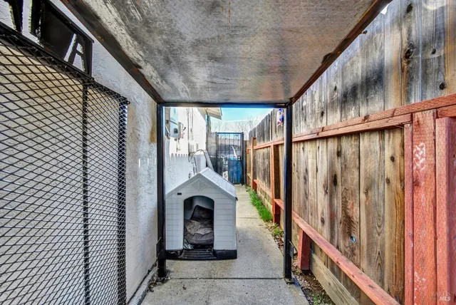 a view of a swimming pool with a yard