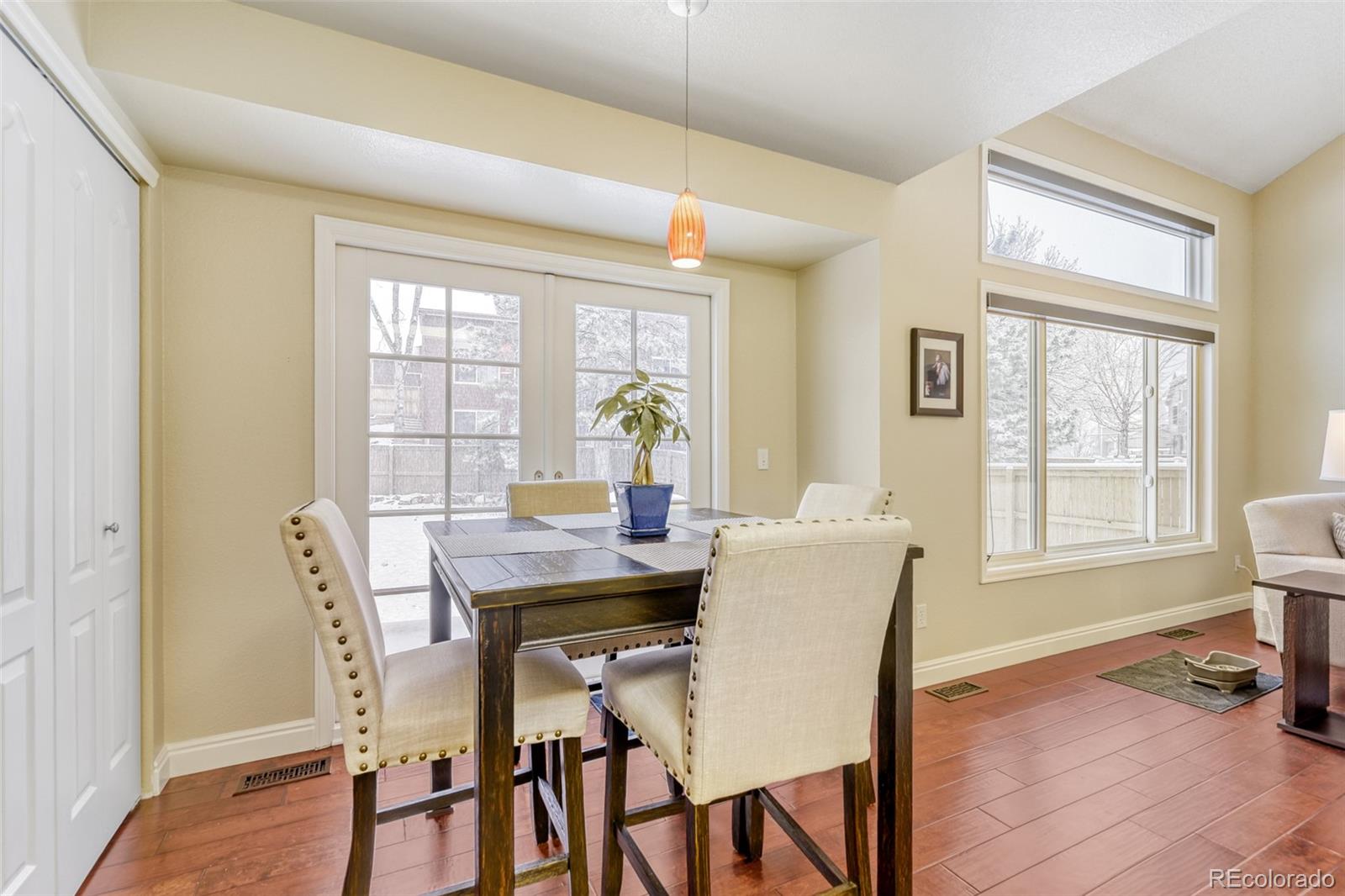 456 Bexley Lane Highlands Ranch, CO 80126 - Photo 13 of 28 a view of a dining room with furniture and windows