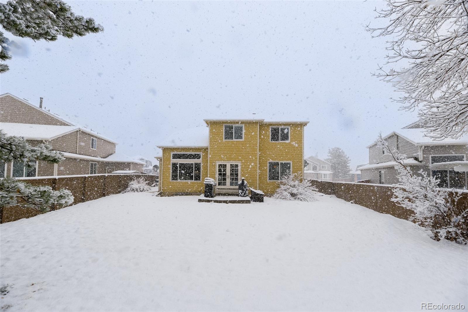 456 Bexley Lane Highlands Ranch, CO 80126 - Photo 28 of 28 a view of a house with outdoor space and sitting area
