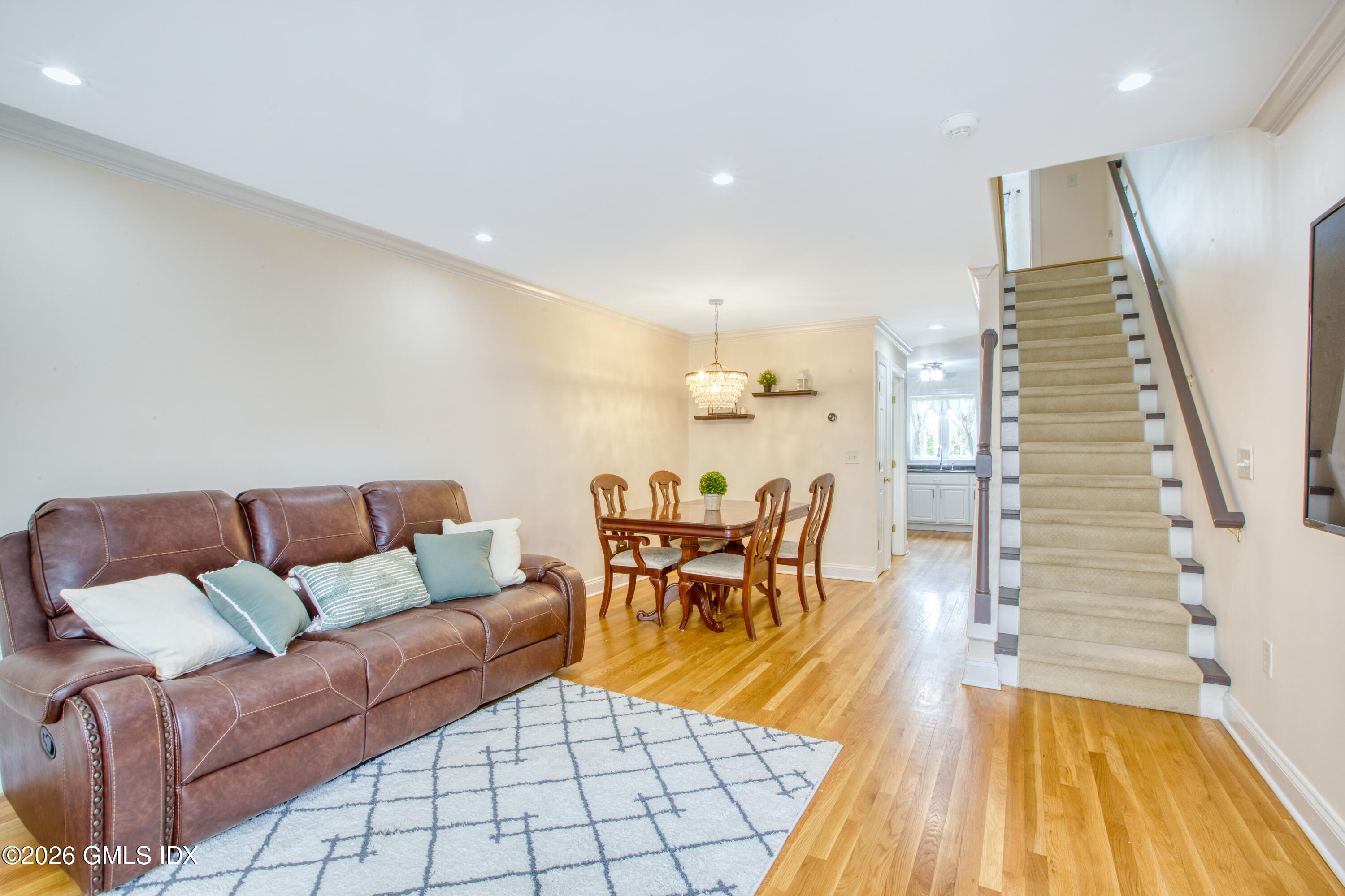 39 Maple Tree Avenue, Unit 40 Stamford, CT 06906 - Photo 4 of 22 39 Maple tree Ave living to dining