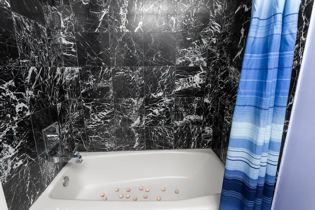 a bathroom with a bathtub