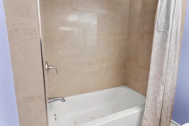 a bathroom with a bathtub