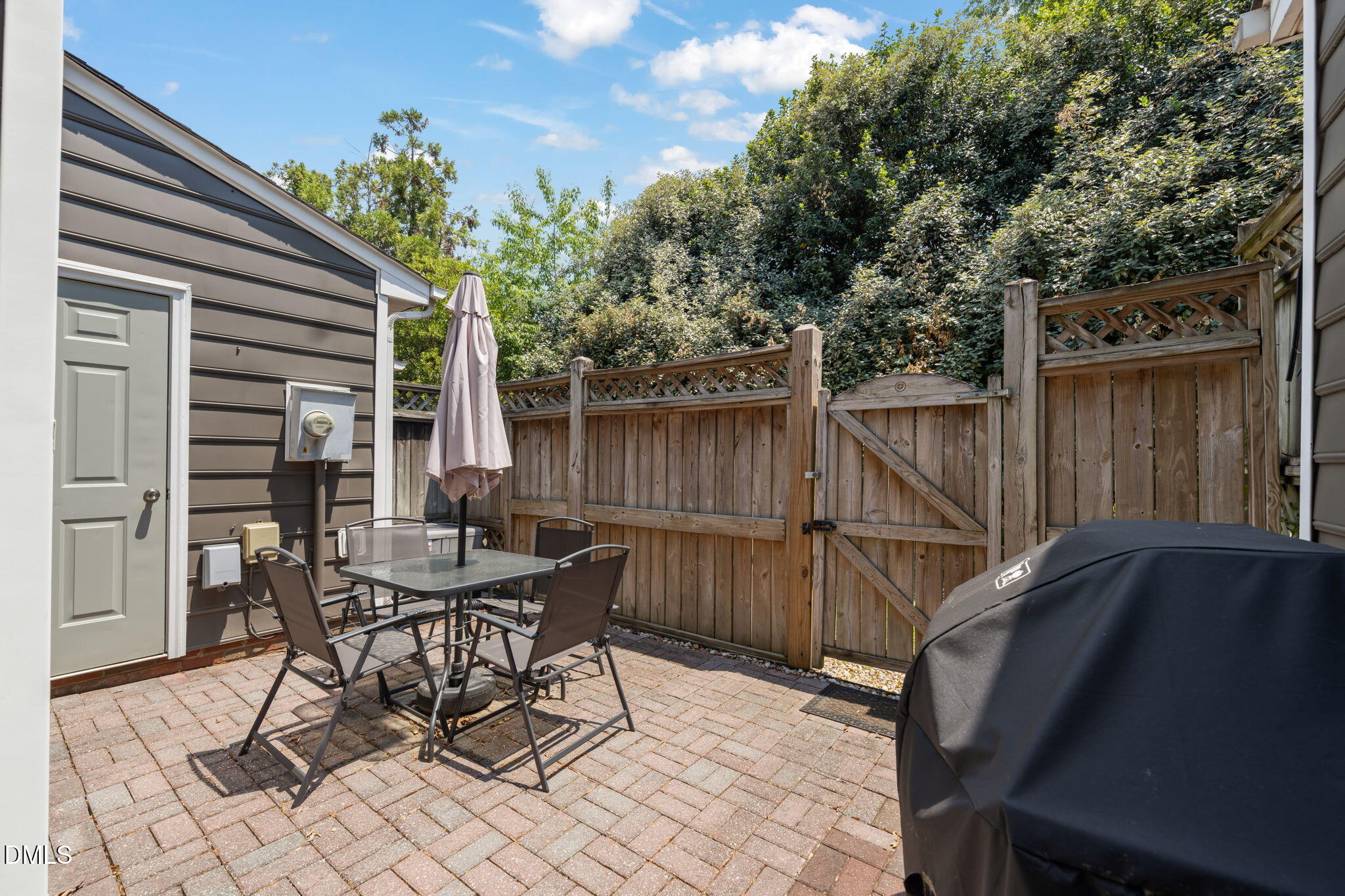 4323 Pine Springs Court Raleigh, NC 27613 - Photo 32 of 38 a view of a patio with couple of chairs