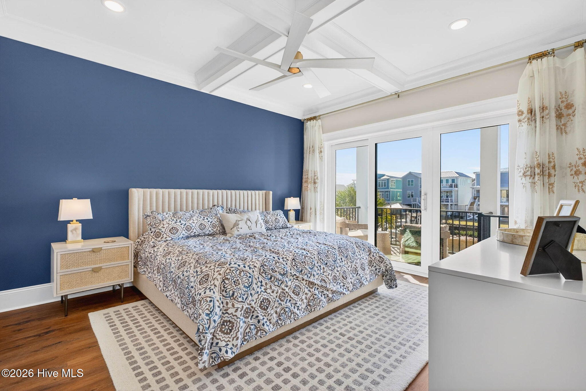 1416 Riverside Drive Sunset Beach, NC 28468 - Photo 29 of 83 Spacious primary bedroom with natural light, coastal design, and relaxing waterfront ambiance.